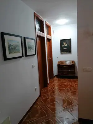 a room with a hallway with a tile floor at Apartma Bistrica in Slovenska Bistrica