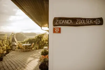 a sign on the side of a building that reads zamboanga textbook at Vineyard Cottage Zdolsek in Šmarje pri Jelšah