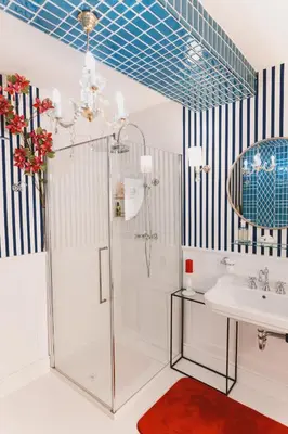 a bathroom with a shower and a sink at Mondo Diverso in Ljubljana