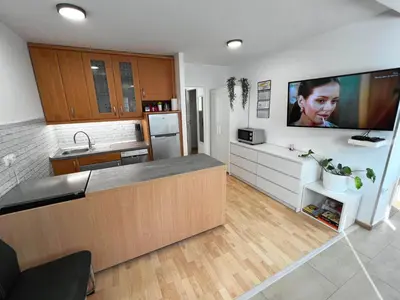 a kitchen with a sink and a counter top at Vila VALENTINA in Čatež ob Savi