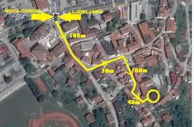 a map of a city with yellow arrows at Apartment Maruška in Tolmin