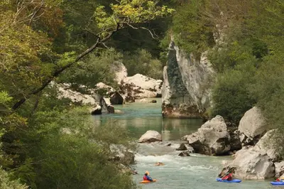 a group of people rafting down a river at Apartment Bon in Kobarid