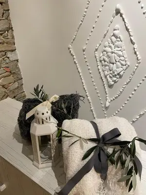 a table with a christmas decoration with a black bow at Vila Imenja in Šmartno