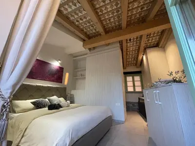 a bedroom with a large bed in a room at Vila Imenja in Šmartno