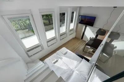 an overhead view of a living room with three windows at Apartma Juniper in Kranjska Gora