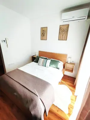a bedroom with two beds in a room at Lucky center Ljubljana in Ljubljana