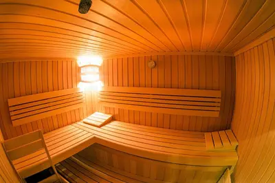 an inside of a sauna with a light in it at Apartments Bohinjskih 7 in Bohinj
