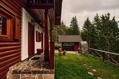 a porch of a house with a gazebo at Apartma Smučišče Krvavec in Cerklje na Gorenjskem