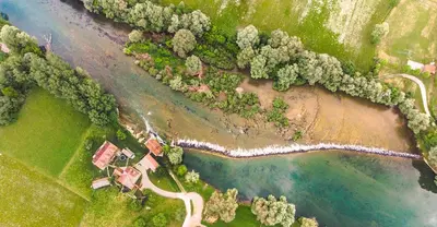 an aerial view of a beach and a river at Fortun Estate - apartmaji ob reki Kolpi in Metlika