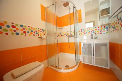 a bathroom with a shower and a toilet at Apartment Leposa in Kranjska Gora