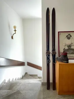 a room with skis leaning against a wall at Gostišče Barbara in Idrija
