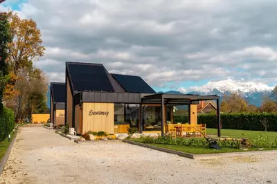a building with solar panels on top of it at Luxury Resort Potatoland in Šenčur