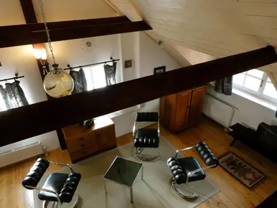 an overhead view of a living room with chairs at Apartment Tagrajska in Ljubljana