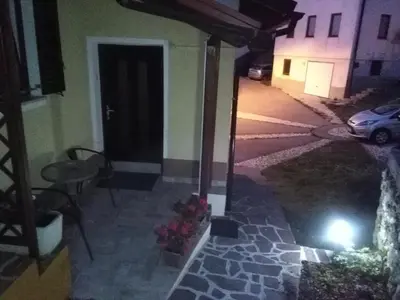 an outside view of a house at night at Country House Fon in Kobarid