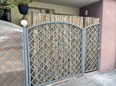 a gate in front of a house at Apartment in Maribor in Maribor