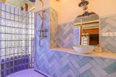 a bathroom with a sink and a mirror at Podhamer Wellness Vineyard Cottages in Ljutomer