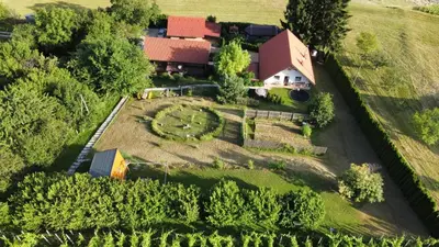 an aerial view of a house with a garden at Hay barn unique experience Visole in Slovenska Bistrica