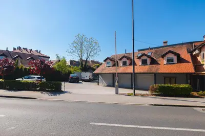 a street with houses on the side of the road at BRIDGE apartments in Ljubljana