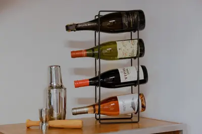 a bunch of wine bottles on a wine rack at BRIDGE apartments in Ljubljana