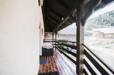 a balcony of a building with a bed on it at Apartment Skala with Magnificent view in Rečica ob Savinji