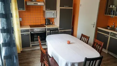 a kitchen with a table with a cup on it at Ljubljana apartment in Ljubljana