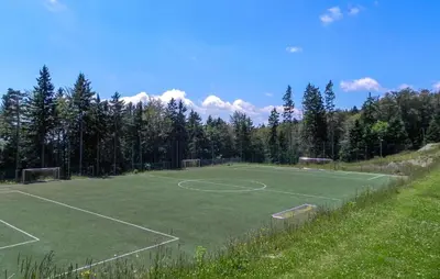 a soccer field with two soccer goals on it at Stunning Apartment In Pohorje With Wifi in Pohorje