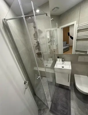 a bathroom with a shower and a sink at Apartma Tisa Bohinj-no outside windows in Bohinj