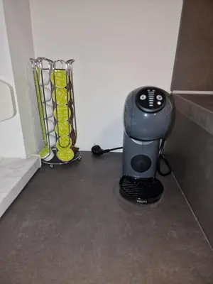 a toaster sitting on the floor in a room at Vila Lastovka in Ljubljana
