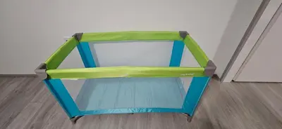 a blue and green dog house with a green top at CILT in Kranj