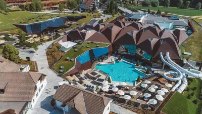 an aerial view of a resort with a swimming pool at Terme Olimia - Apartment 407 in Podčetrtek