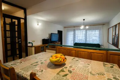 a bowl of fruit on a table in a room at Apartment Maj, Kranjska Gora - Center in Kranjska Gora