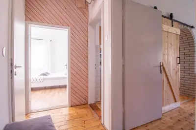 an open door in a room with a window at Garden apartment No.3 in Bled