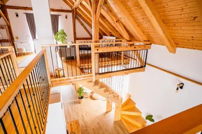 an overhead view of a large room with wooden ceilings at Pri stari mami in Tomaž pri Ormožu