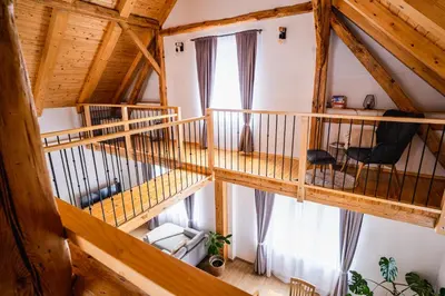 an overhead view of a living room with wooden ceilings at Pri stari mami in Tomaž pri Ormožu