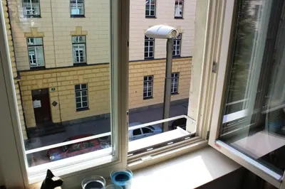 a window with a view of a building at Ljubljana City Apartment Metelkova in Ljubljana