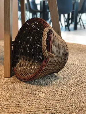 a wicker basket sitting on top of a table at Hotel Cubis in Lendava