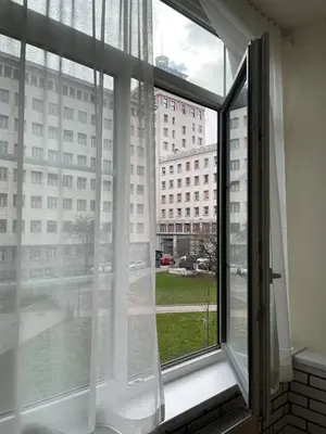 an open window with a view of a building at Apartment Joja in Ljubljana