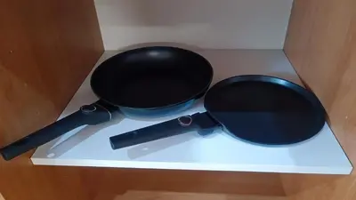 a black pan sitting on top of a stove at Apartma Ferida in Bovec