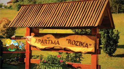 a sign that saysarma roka on the side of a building at Apartment Rozika in Slovenj Gradec