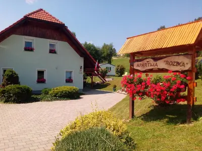a building with a sign that says croatian house at Apartment Rozika in Slovenj Gradec