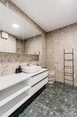 a bathroom with a sink and a mirror at Adventure Oasis Bovec in Bovec