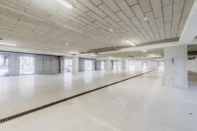 an empty gym with a dance floor in a building at Adventure Oasis Bovec in Bovec