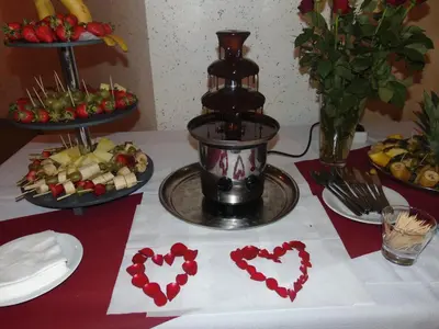 a table with valentines hearts on top of a table at Guesthouse Kaučič in Benedikt v Slovenskih Goricah