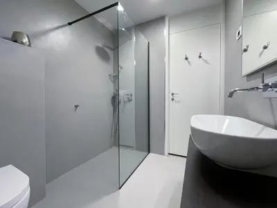 a bathroom with a glass shower and a sink at Apartment Silver Deer, Kranjska Gora in Kranjska Gora