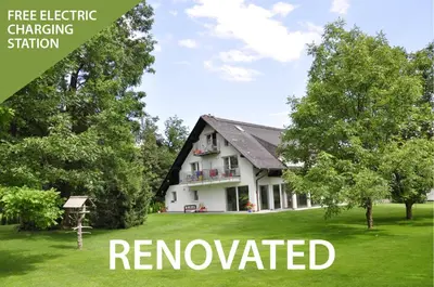 a house with the words renovated in front of it at Apartments Bledea in Bled