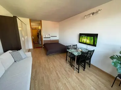 a living room with a couch and a table at Apartment in Ljubljana center in Ljubljana