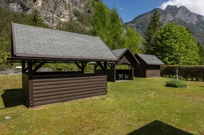 a gazebo and a pavilion in a yard at Metoja in Soča