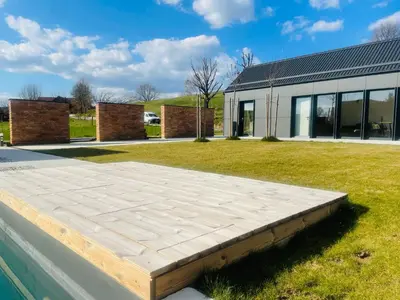 a patio in front of a building at Luxury Holiday House BREZOV BREG in Dankovci