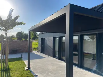 a modern house with a black roof at Luxury Holiday House BREZOV BREG in Dankovci