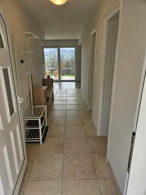 a hallway with a tile floor in a house at House Tereza near Olimje, Podčetrtek in Pristava pri Mestinju
